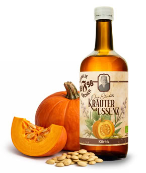 Eine braune Flasche mit einem Etikett, das "Kräuter Essenz" zeigt, neben einer Artischocke.